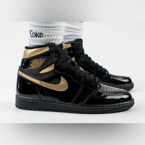 Black and gold metallic Jordan 1